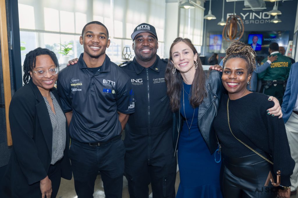 Pictured (from L to R): Brenda Morrison, The Miami Foundation Open for Business Associate; Vontre Curry, BITTS graduate and aspiring pilot; Captain Irving, Founder of Experience Aviation and the Flying Classroom; Brittany Morgan, The Miami Foundation Economic Resilience Director; and Sommer Curry: CEO of Designs by Sommer